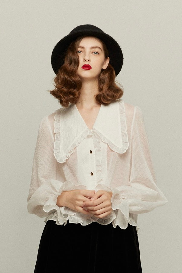 《メリーがまた嫉妬している》シースルーフリルブラウス-Off White