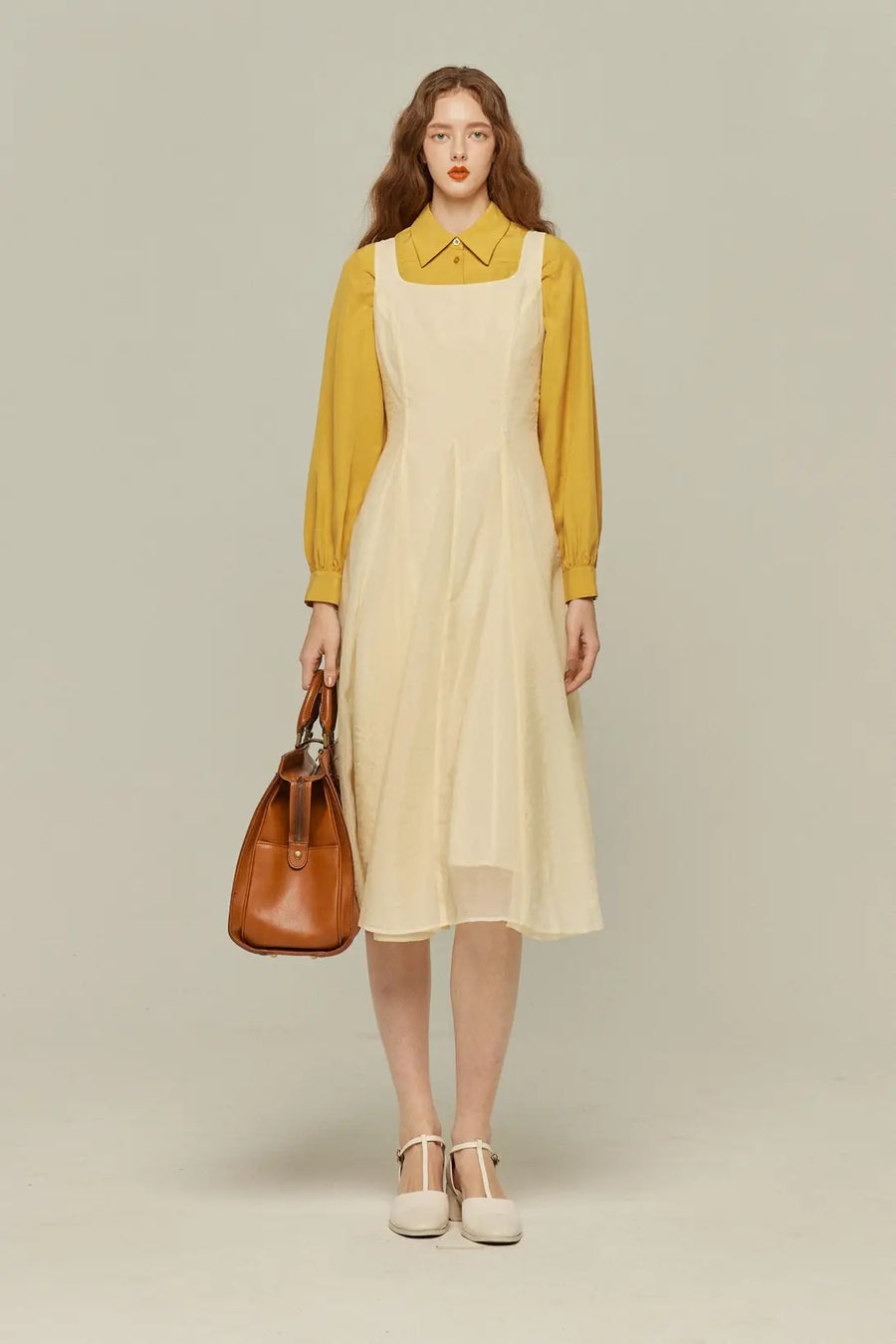《手でペンを回し続ける》リヨセルリネンブラウス-Yellow